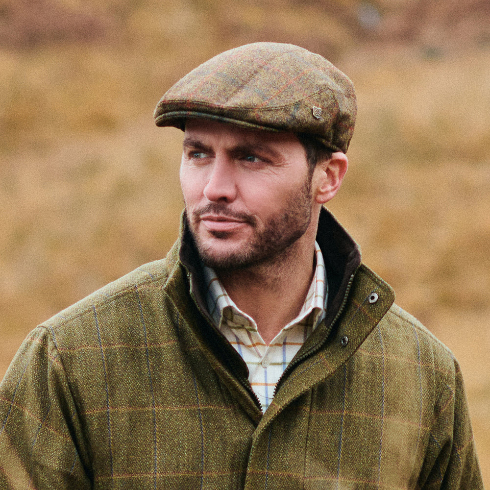 Gorra plana Gamekeeper repelente al agua a cuadros de Failsworth - Marrón-Ladrillo-Azul