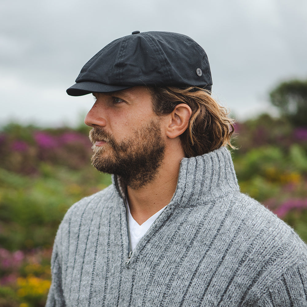 Gorra newsboy impermeable de Jaxon & James Negro al por mayor