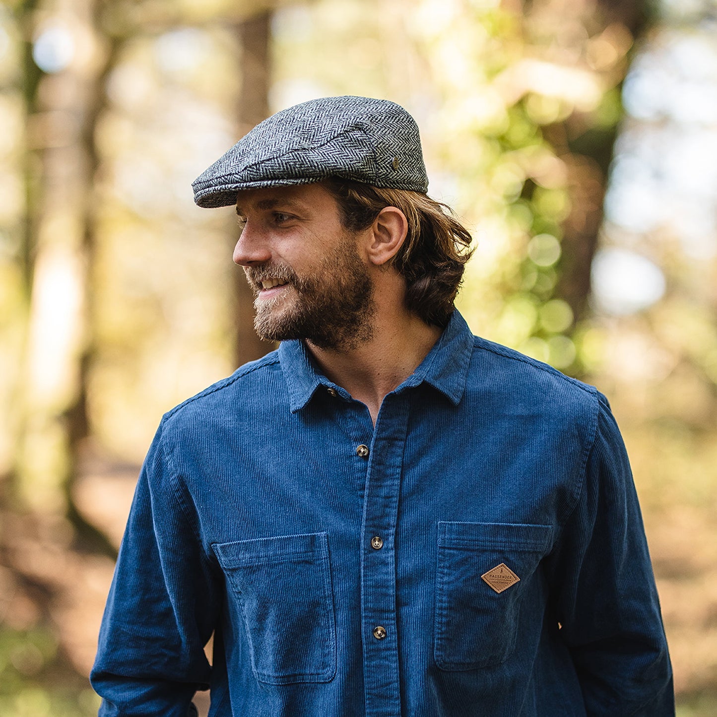 Gorra plana Kinloch de HARRIS TWEED diseño de espiga de Jaxon & James - Negro-Gris