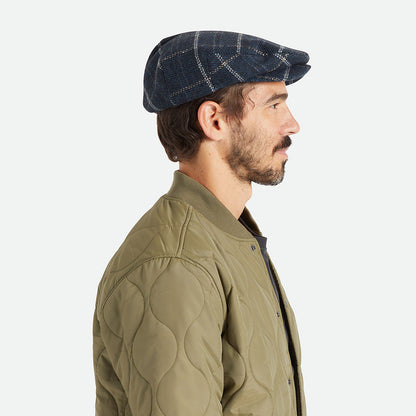Gorra plana Hooligan holgada a cuadros de Brixton - Azul-Negro