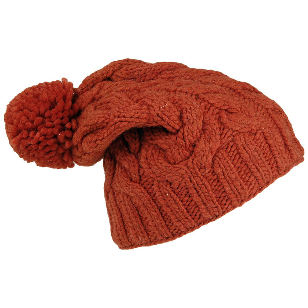Gorro con pompón Oversized de Kusan - Ocre
