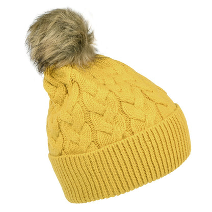 Gorro con pompón Elena punto de cable Pompón de piel sintética de Joules - Mostaza