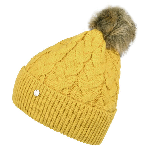 Gorro con pompón Elena punto de cable Pompón de piel sintética de Joules - Mostaza