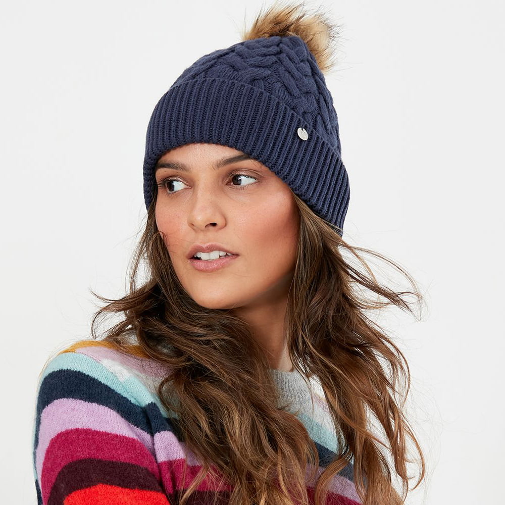 Gorro con pompón Elena punto de cable Pompón de piel sintética de Joules - Azul Marino