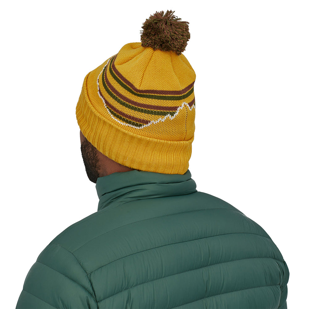 Gorro con pompón Fitz Roy Stripe Powder Town de Patagonia - Mostaza