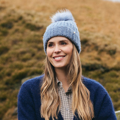 Gorro con pompón Lily de piel sintética de Failsworth - Azul