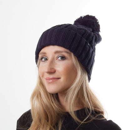 Gorro tejido con pompón de Jaxon & James Azul marino al por mayor